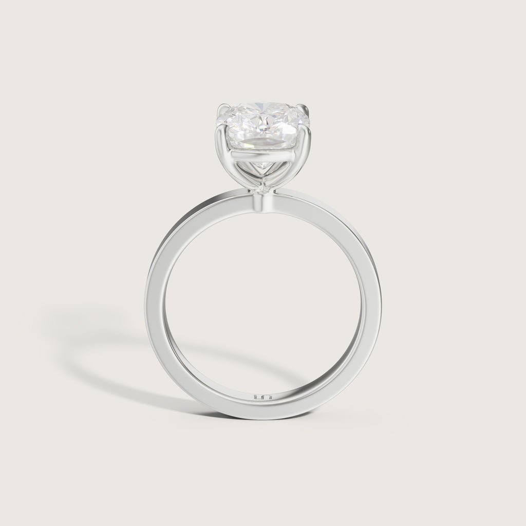 Silver ring with a diamond on a light gray background white gold platinum 