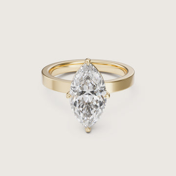 Yellow gold ring with a marquise-shaped 