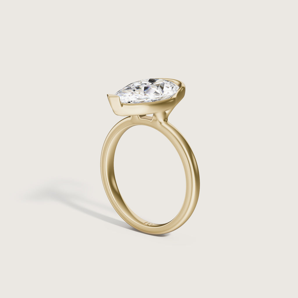 Lune Half Bezel Pear Solitaire