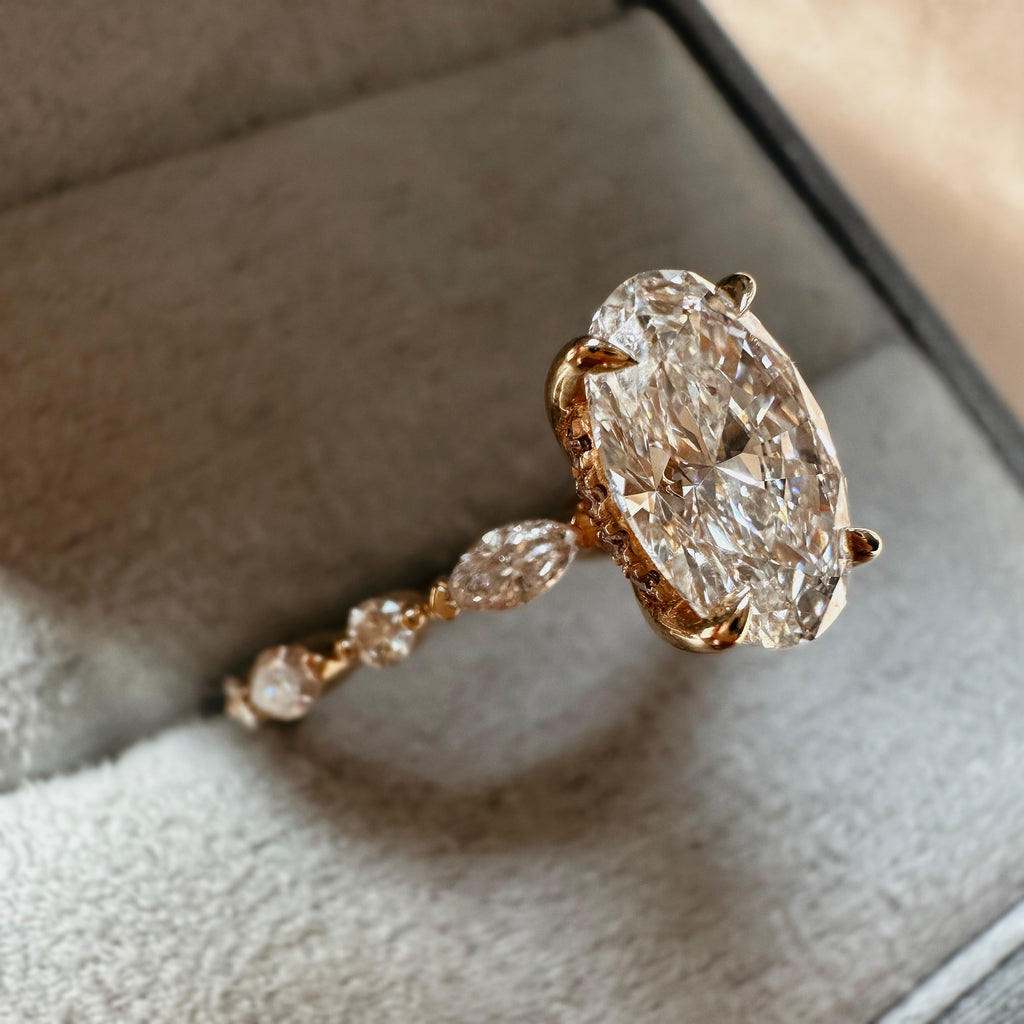 1.50ct Oval with Marquise and Round Side Stones