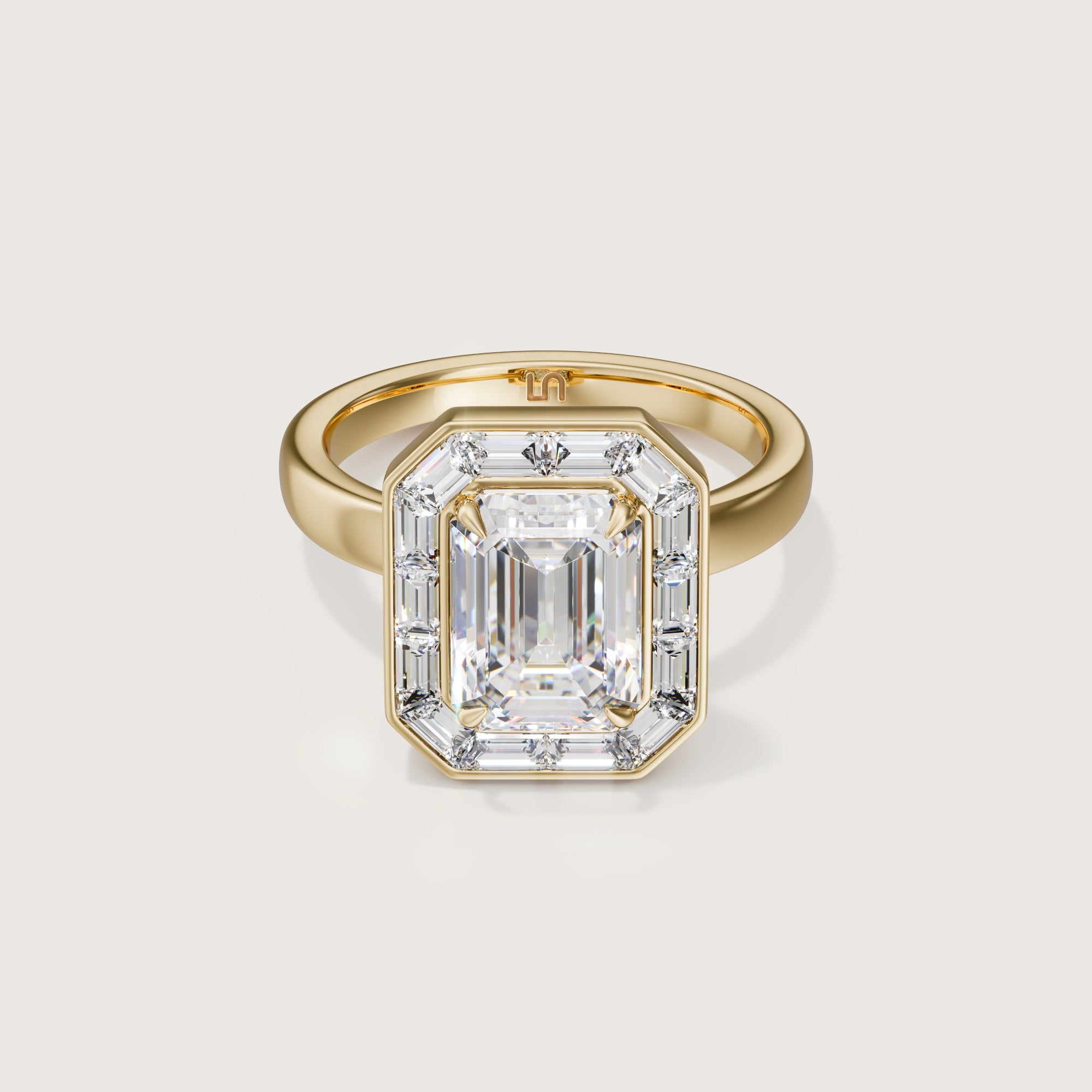 Emerald cut diamond on sale with baguette halo