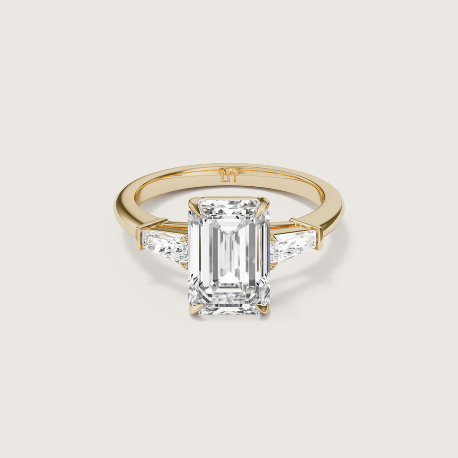 Mayfair 3 stone trilogy emerald Lindelli yellow gold engagement ring  