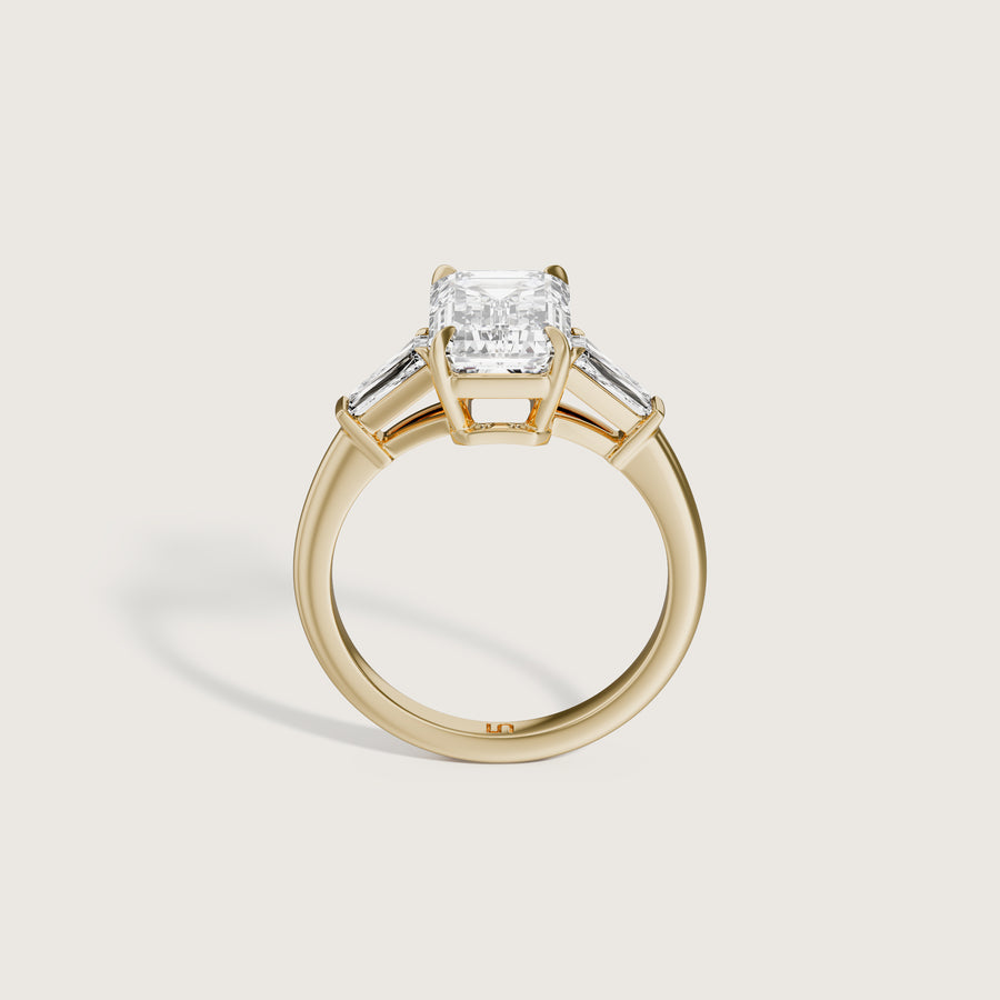 Mayfair 3 stone trilogy emerald Lindelli yellow gold engagement ring  